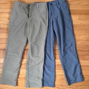 Two pairs of boys Under Armour golf pants